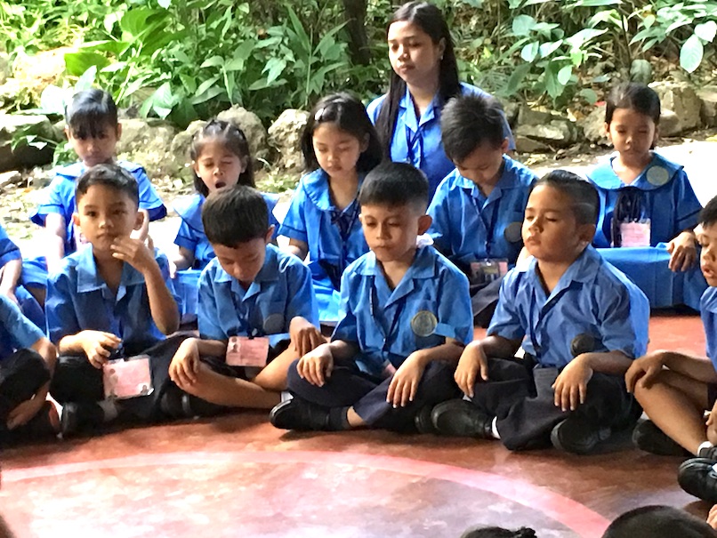 Golden Link students observing inner silence or daily meditation